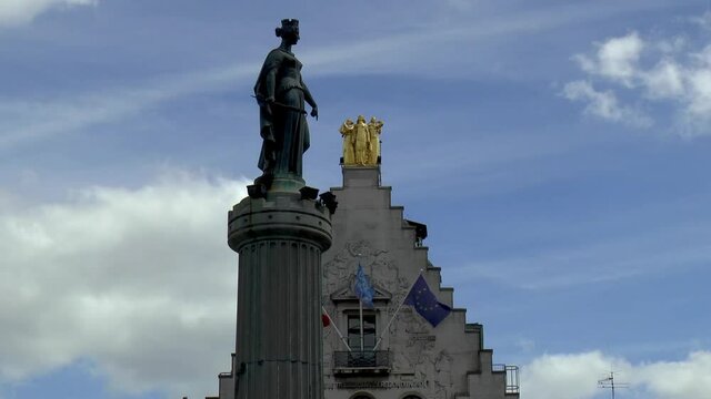 Column of the Goddess, Colonne de la D&eacute;esse, and traditional building at Place Charles de Gaulle, Lille, France.