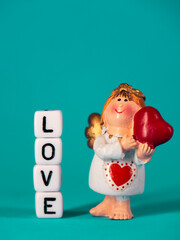 Cute angel and a declaration of love. Valentine's Day. Postcard for the holidays.