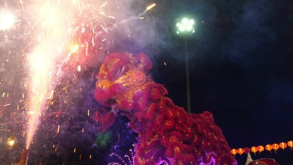 Chinese lion performing during chinese new year celebration at Chinatown Thailand.