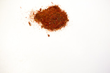 Dry saffron. Spices for dishes. White background.