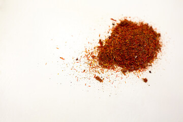 Dry saffron. Spices for dishes. White background.