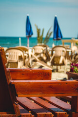 Obraz premium table and chairs on the beach