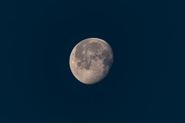 Growing phase moon in dark sky