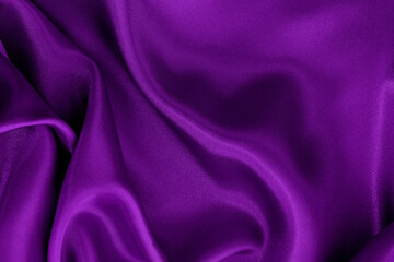 Dark purple fabric texture background, detail of silk or linen pattern.