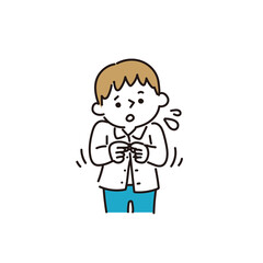 洋服のボタンがうまくとめられなくて焦る男の子