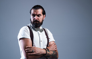 handsome guy hipster with moustache and beard, male beauty