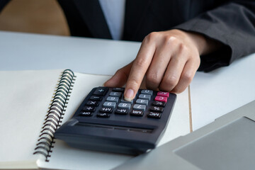 employee accountant man hand press on calculator for make financial report or company's profit...