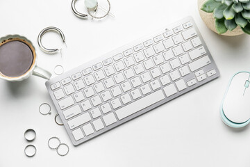 Computer keyboard and mouse on white background