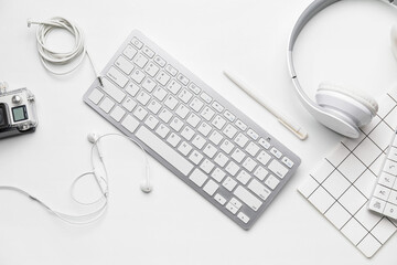 Computer keyboard and different modern devices isolated on white background