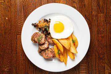 breakfast with fried egg and sausage