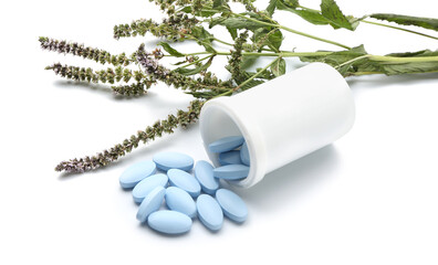 Plant based pills on white background