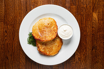 potato pancakes with sour cream