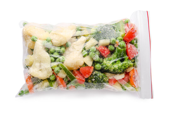 Frozen Vegetables In Plastic Bag On White Background