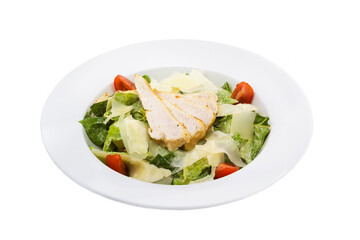 Seafood Caesar salad, arugula, and parmesan cheese on a round white plate. Isolated.