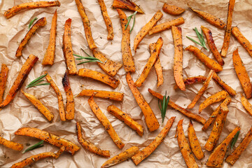 Tasty cooked sweet potato on parchment