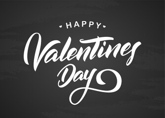 Greeting type lettering of Happy Valentine's Day on chalkboard background