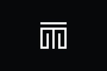 TM logo letter design on luxury background. MT logo monogram initials letter concept. TM icon logo design. MT elegant and Professional letter icon design on black background. M T MT TM - obrazy, fototapety, plakaty