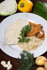 Baked pork chop with sauerkraut. Restaurant service concept. Close-up.