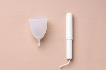 Top view of menstrual cup and medical tampon