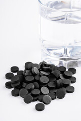 activated carbon on a white acrylic background