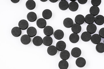 activated carbon on a white acrylic background
