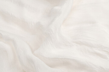 Soft smooth white silk fabric background. Fabric texture.