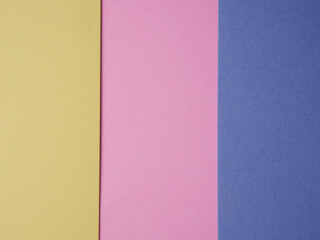 Multi-color background composition of cardboard of different colors postcard