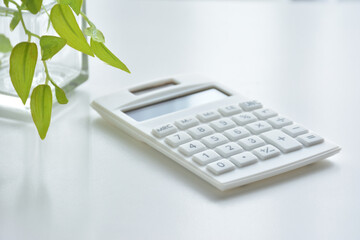 Calculator on a white desk