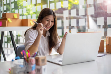 Asian business owners use this chart to communicate with customers via video calling. Online while working in the home office