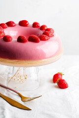 Sweet strawberry mousse cake dessert on a plate