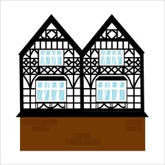 Old german house with black wooden beams. Windows with glare. Colored half timbered building. Flat facades of european framing houses, cottages