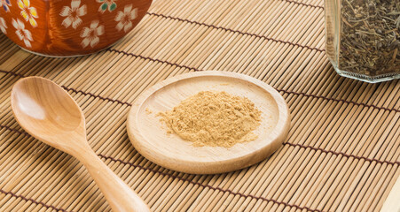 Soy flour in wooden bowl. Japanese Kinako.
