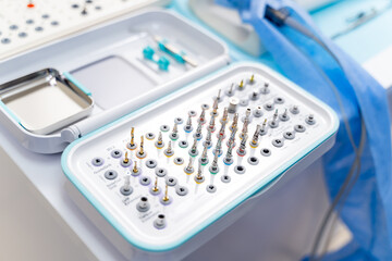 Set of professional instruments in dentist's office. Complete modern set of dentist`s drills.