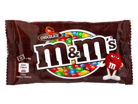BUCHAREST, ROMANIA - MARCH 11, 2015. M&M's Chocolate candies isolated on white. M&M is one of the most famous candy treats in the world since 1941