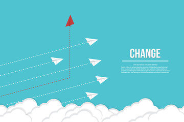 Think differently. Red airplane changing direction. New idea, change, trend, courage, creative solution, innovation and unique way concept. 