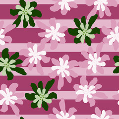 Cartoon botanic seamless pattern with green and lilac flower daisy print on striped background.