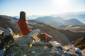 woman takes a break during the hike