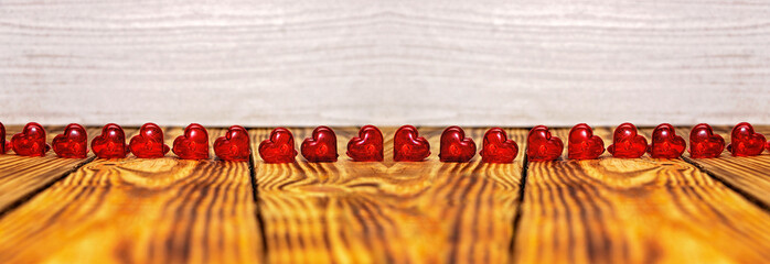 The hearts are beautifully laid out on a wooden background. horizontal photo for a kitchen panel...