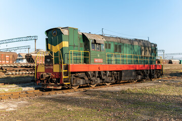 Fototapeta na wymiar Kyiv (Kiev), Ukraine - January 2, 2020: Old and rusty freight cargo train, carriages, tank truck, oil tank car, cistern car, railroad, railway
