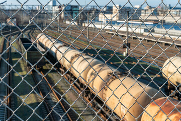 Kyiv (Kiev), Ukraine - January 2, 2020: Old and rusty freight cargo train, carriages, tank truck, oil tank car, cistern car, railroad, railway