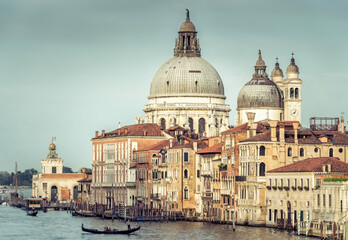 Obraz na płótnie Canvas The grand canal in Venice Italy looking towards Basilica di Santa Maria della Salute from Acadamia Bridge
