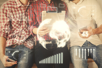 Double exposure of forex graph drawing and man and woman working together holding and using a mobile device. Trade concept.