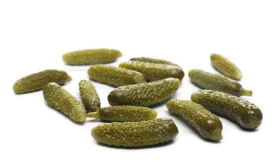 Pickled gherkin pile, pickles isolated on white background