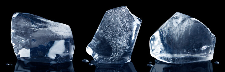 Set of three pieces of crushed ice isolated on a black background with clipping path.