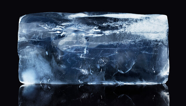 A rectangular block of ice isolated on black background with clipping path.