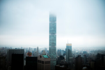 Fototapeta na wymiar city skyline at fog