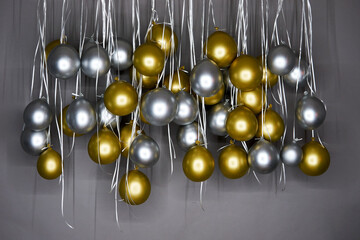 Golden and silver balloons background. Colorful balloons