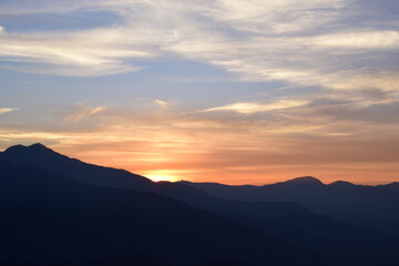 Fototapeta premium sunset over the mountains
