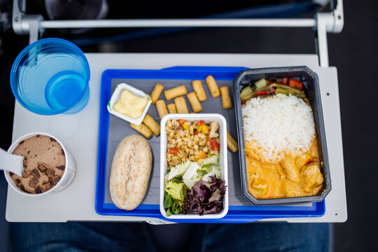 Airplane Food On A Gray And Blue Tray From Above