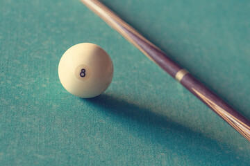 billiard ball on green cloth